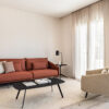 Evolution design -Design meubels-interieurwinkel-design winkel - zetel - sofa - rood - beige fauteuil - woonkamer - living